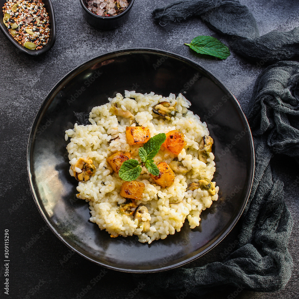 risotto mussels, vegetables (main course, rice seafood) menu concept. food background. top view. copy space risotto mussels, vegetables (main course, rice seafood) menu concept. food background. top view. copy space