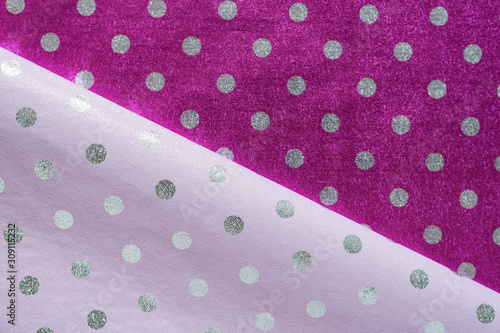 Lilac and purple shiny wrapping paper with polka dots. Foil for gift wrapping design. Stylish shiny texture photo