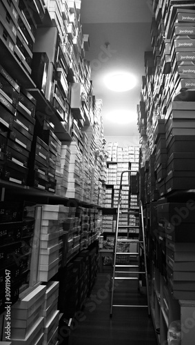 Photography shoe storehouse with shoe boxes in black a white