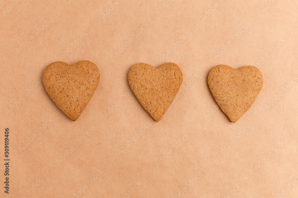 ginger biscuit heart on craft paper ginger biscuit heart on craft paper