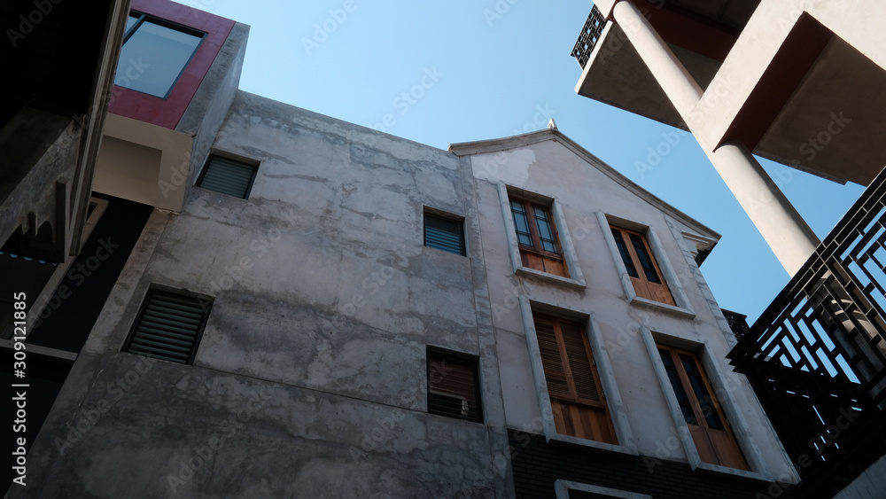 details of a modern loft construction of houses and clean blue sky, contrast of buildings. details of a modern loft construction of houses and clean blue sky, contrast of buildings.
