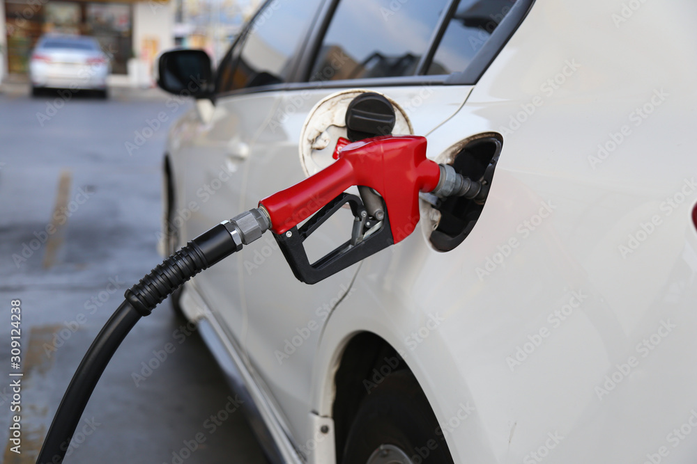 Car refueling on the petrol station. Car refueling on the petrol station.