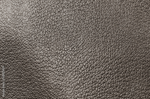 Elegant dark brown leatherette background. Dermantin texture.