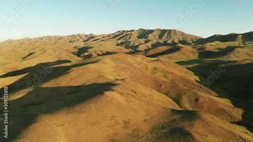 Panoramic view of green mountains. Yolyn Am at sunset. Aerial view. Mongolia. photo