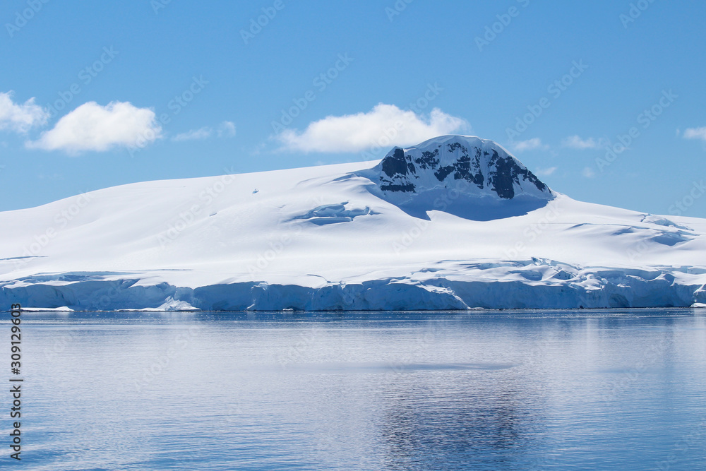 The frozen coasts of an island along the coasts of the Antarctic Peninsula, Antarctica