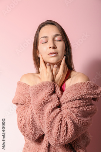 Fashionable young woman on ...