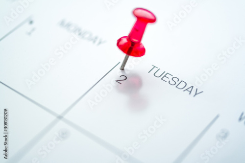 Red push pin on calendar every 2nd of the month