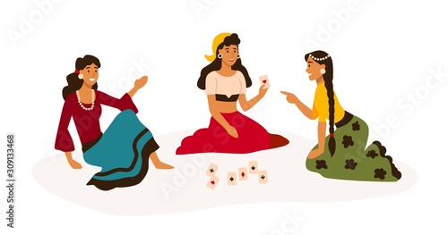 Gypsy women in bright traditional clothes reading cards flat vector illustration. Fortune tellers isolated on white background. Playing card games. Nomadic people colorful cartoon characters.