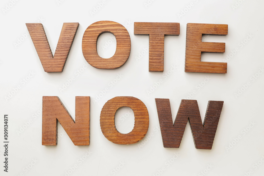 Text VOTE NOW on white background