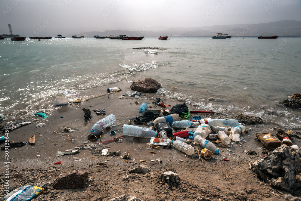 Fototapeta premium different garbage on the beach