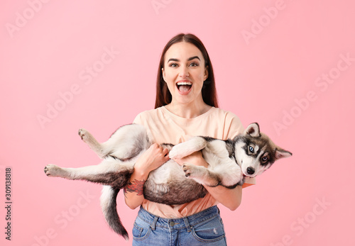 Cute woman with funny husky...