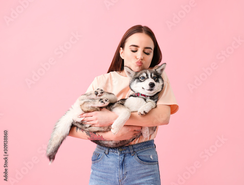 Cute woman with funny husky...