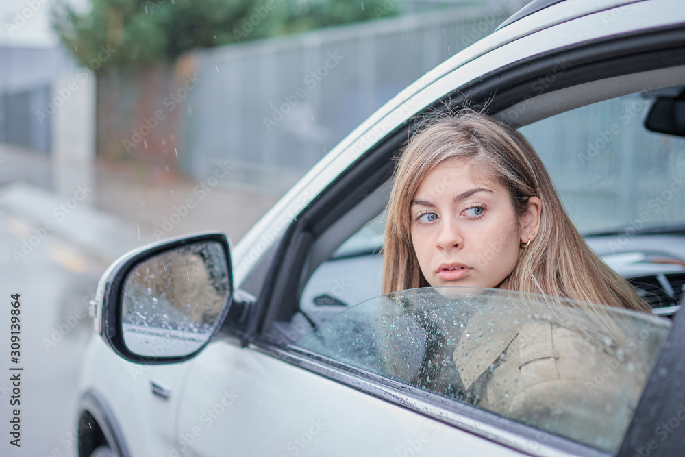 business girl in the car looking back business girl in the car looking back