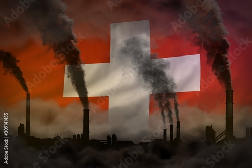 Dark pollution, fight against climate change concept - industrial 3D illustration of factory pipes heavy smoke on Switzerland flag background