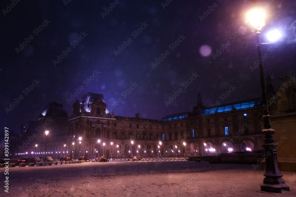 Place de Carrousel square, Paris under snow, night