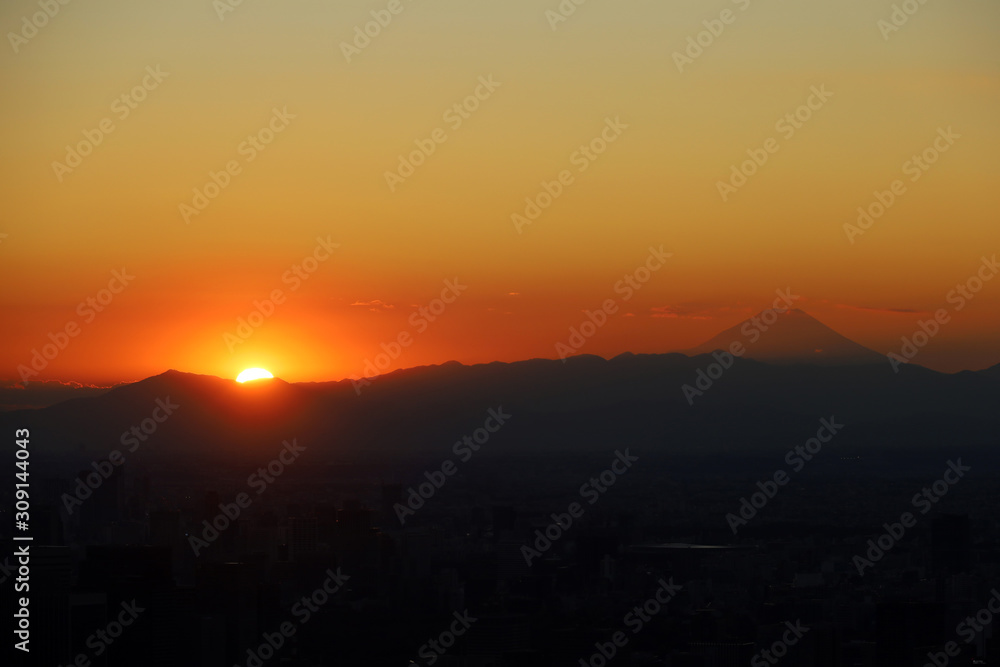 Beautiful city landscape looking view Fuji from Tokyo city in the sunrise or sundown colorful in the evening. Beautiful city landscape looking view Fuji from Tokyo city in the sunrise or sundown colorful in the evening.