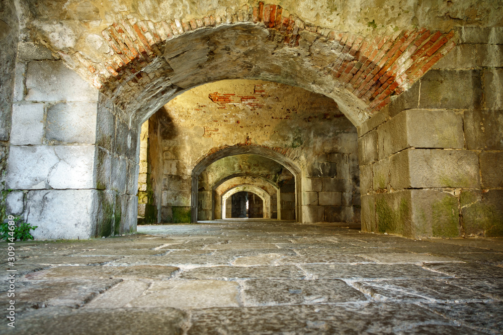 Old abandoned building passage bottom view