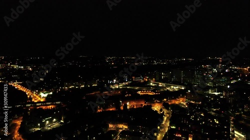 Wallpaper Mural A smooth, approaching aerial shot on Helinski, Finland as a train passes through the city in the distance. Torontodigital.ca