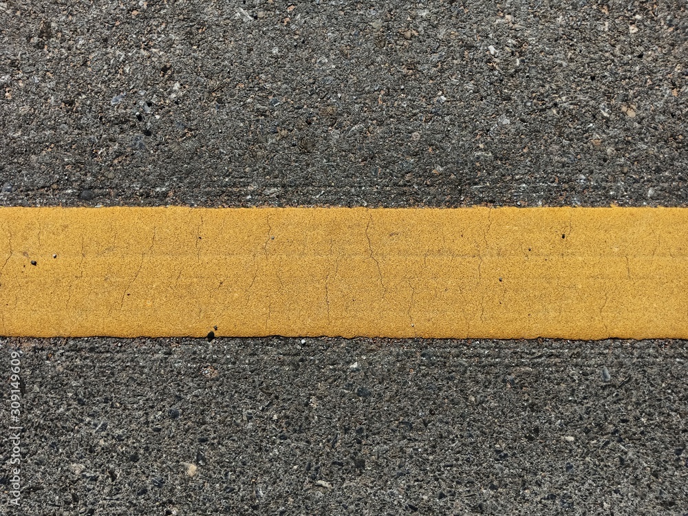 Fototapeta premium Yellow traffic line in Thailand