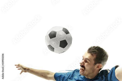 Fototapeta Naklejka Na Ścianę i Meble -  Close up of emotional caucasian man playing soccer hitting the ball with the head on isolated white background. Football, sport, facial expression, human emotions, healthy lifestyle concept. Copyspace