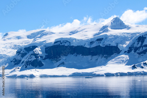 Snow-capped mountains on an island along the coasts of the Antarctic Peninsula, Palmer Archipelago, Antarctica © Marco Ramerini