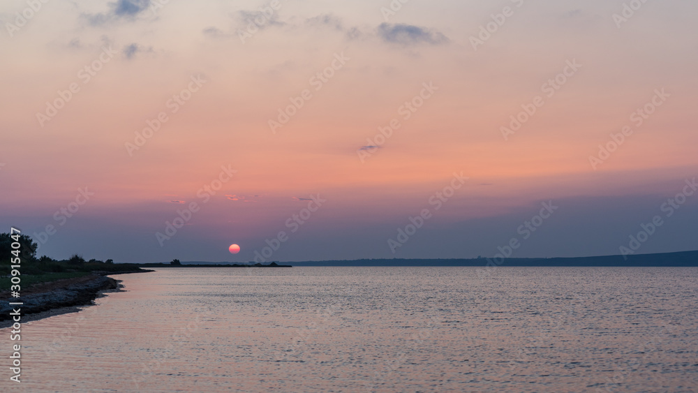Amazing Sunset over Estuary. Blagoveshenskaya, Black Sea, Russia.