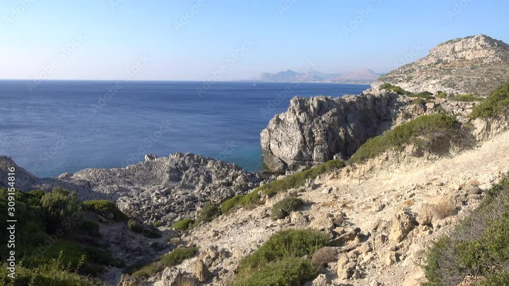 Mediterranean sea, coast, rocky coast, Sunny day, Rhodes island Greece. Mediterranean sea, coast, rocky coast, Sunny day, Rhodes island Greece.