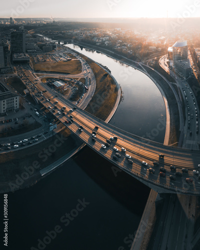 Bridge traffic over river on Neris, Vilnius, Lithuania, aerial view