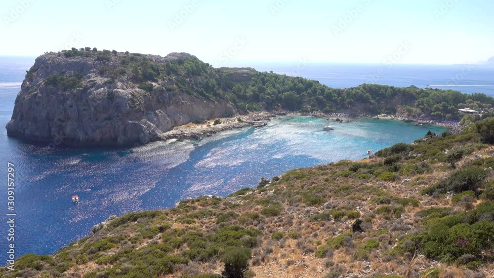 Anthony Quinn Bay coast of the Mediterranean sea, rocky beach, beach island of Rhodes Greece. Anthony Quinn Bay coast of the Mediterranean sea, rocky beach, beach island of Rhodes Greece.