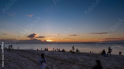 Time lapse video of Stone town beach during sunset photo