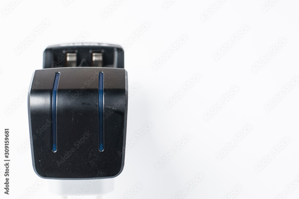 Battery charger isolated on white background.Copy space Battery charger isolated on white background.Copy space