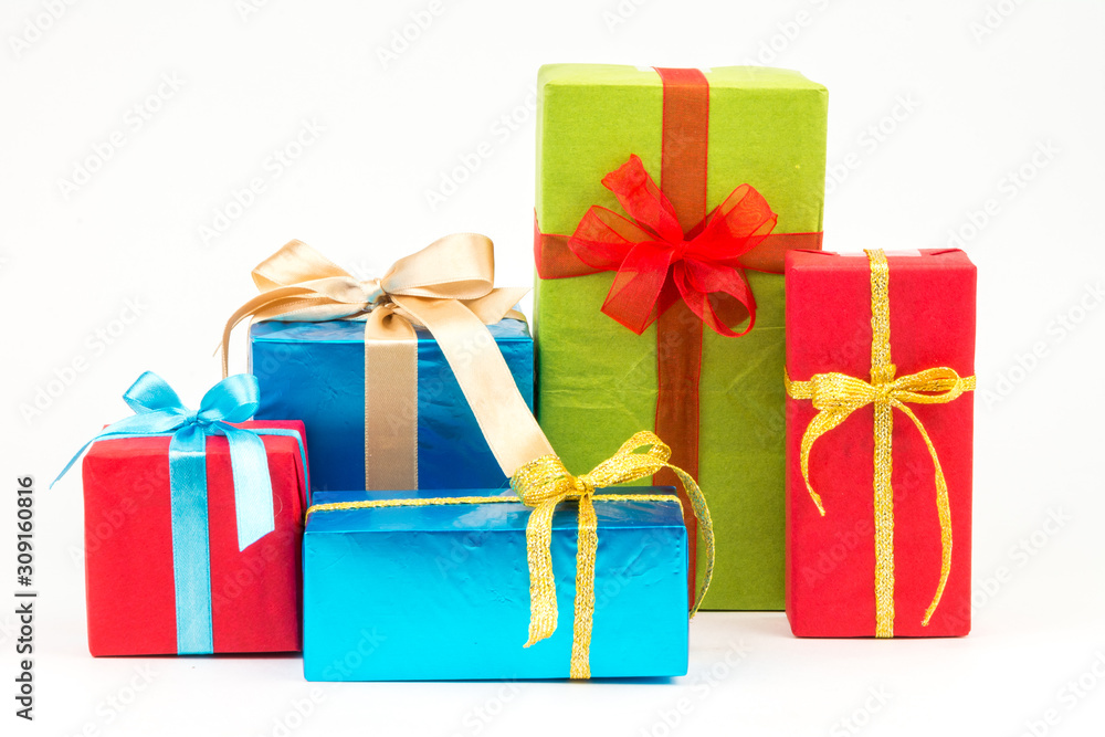 Gift boxes with ribbons and christmas decor isolated on white background. Happy birthday colorful gifts Gift boxes with ribbons and christmas decor isolated on white background. Happy birthday colorful gifts