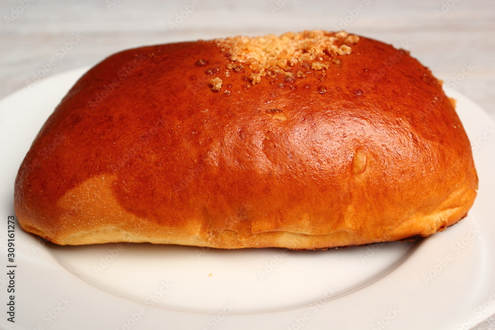 Blueberry Bun. Bun made from yeast dough, filled with bilberries, delicately covered with crumble. Blueberry Bun. Bun made from yeast dough, filled with bilberries, delicately covered with crumble.