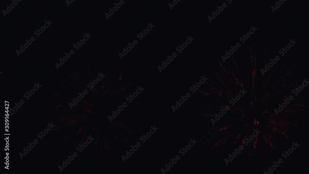 Real fireworks exploding celebration frame fill and loop seamlessly abstract blur bokeh lights in the night sky with the glowing fireworks show festival. Slow Motion 125fps to 25fps Real fireworks exploding celebration frame fill and loop seamlessly abstract blur bokeh lights in the night sky with the glowing fireworks show festival. Slow Motion 125fps to 25fps