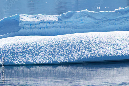 An iceberg among the islands around the Antarctic Peninsula, Palmer Archipelago, Antarctica. © Marco Ramerini