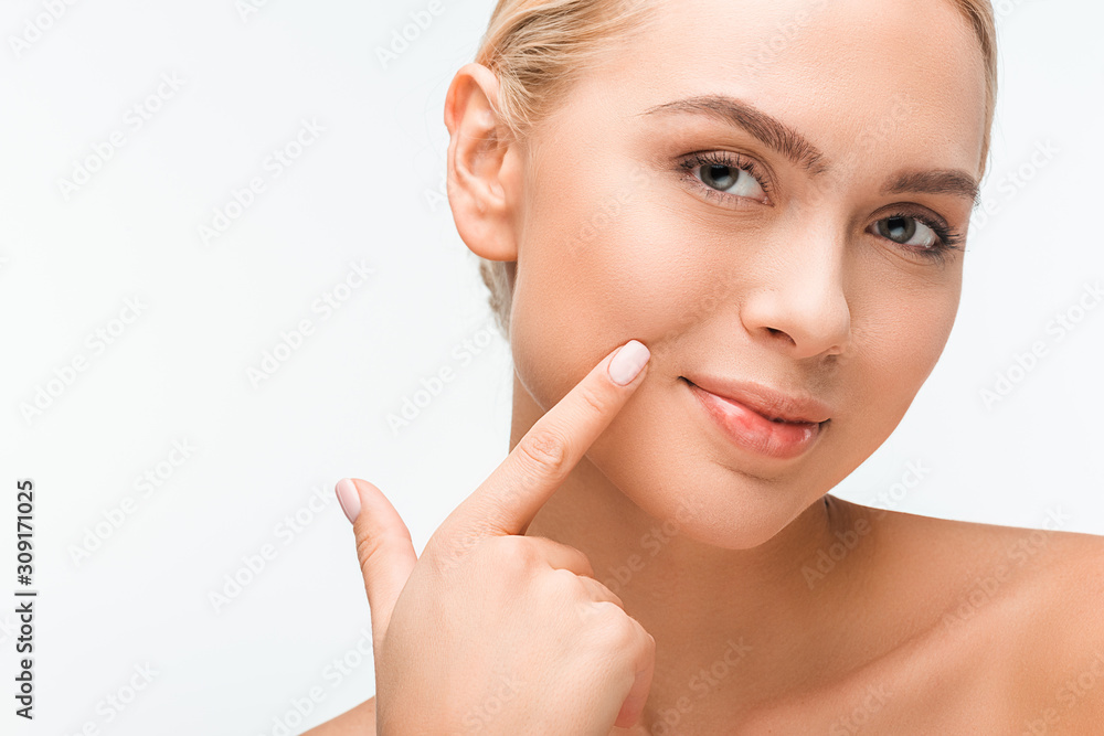 cheerful woman pointing with finger at face isolated on white cheerful woman pointing with finger at face isolated on white