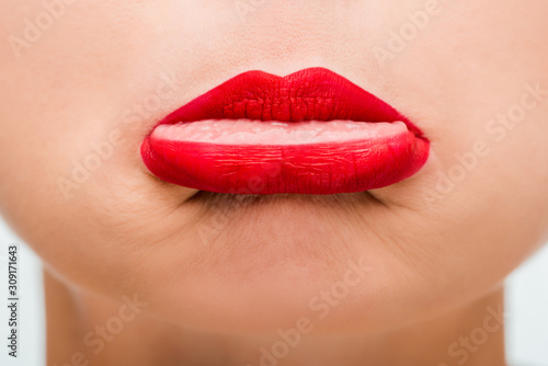 close up of sad young woman with red lips