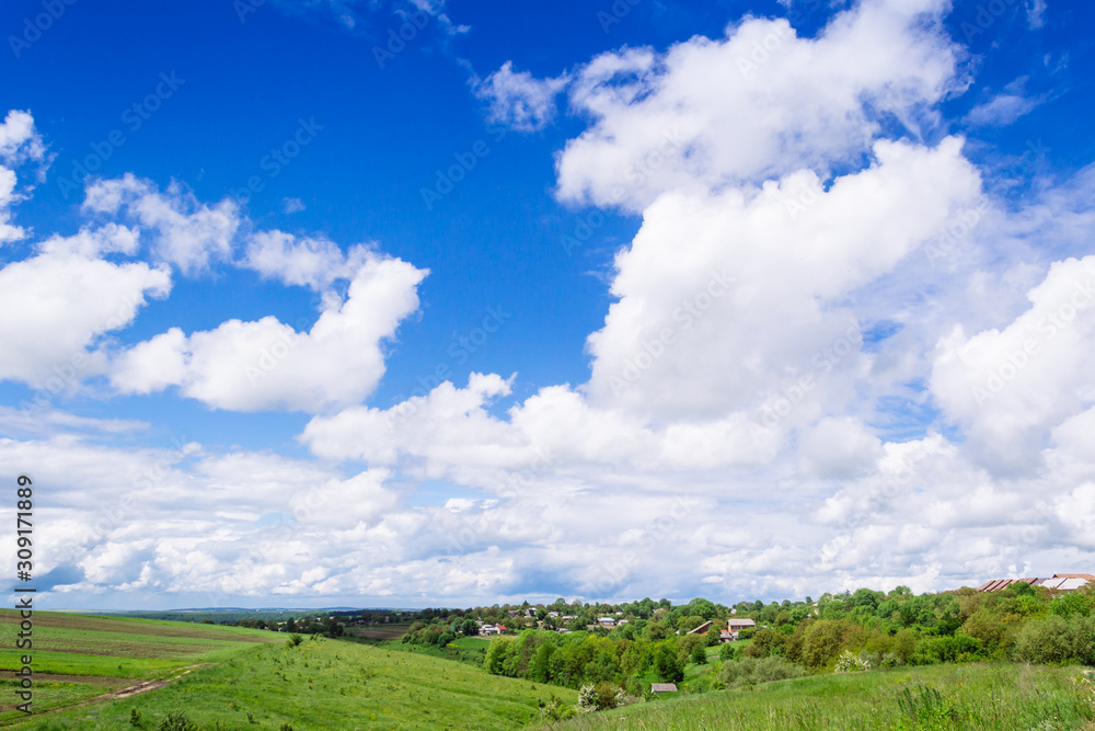 spring yellow field in the village and beautiful sky spring yellow field in the village and beautiful sky