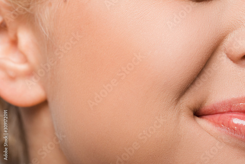 close up of woman with blush on cheek photo