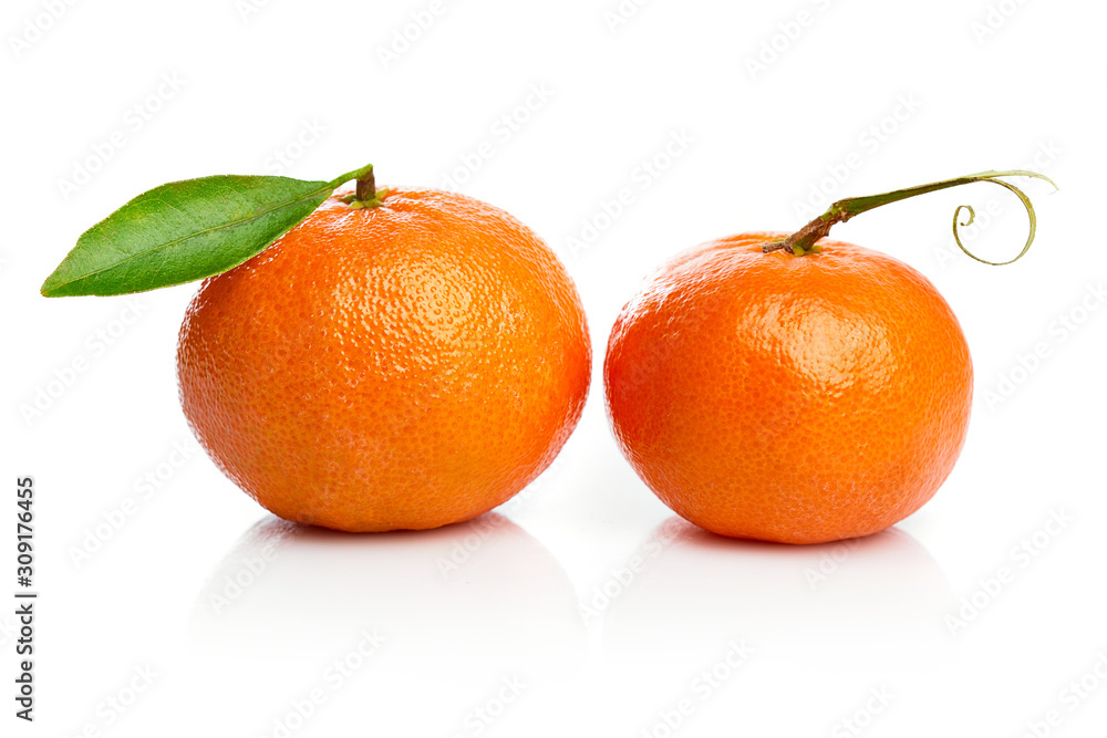 Ripe tangerines with green leaf for design packing. Fruity still life citrus. Isolated on white background. Ripe tangerines with green leaf for design packing. Fruity still life citrus. Isolated on white background.