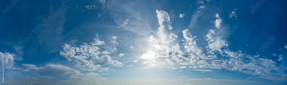 Obraz premium Fantastic clouds against blue sky, panorama