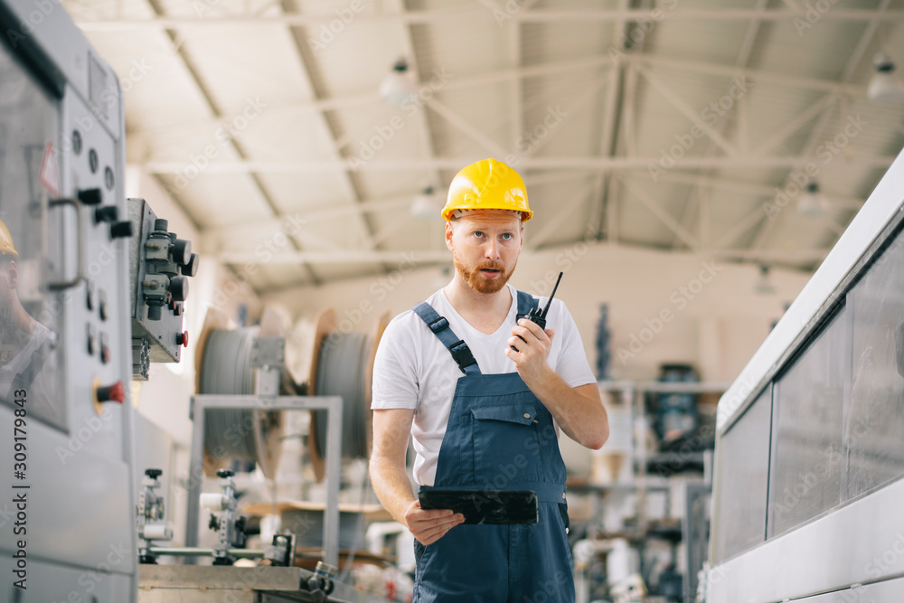 Factory worker with talkie walkie. Factory worker with talkie walkie.