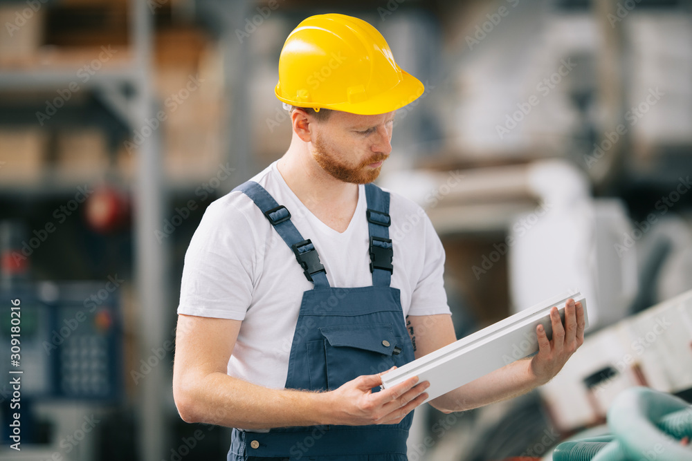 Factory worker. Man with helmet working with pvc. Factory worker. Man with helmet working with pvc.