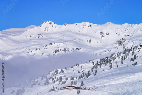 Landscape at Zillertal Arena ski resort in clouds in Austria