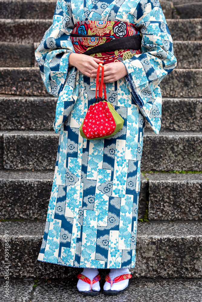 Detail of a japanese woman dressed in traditional costume Detail of a japanese woman dressed in traditional costume