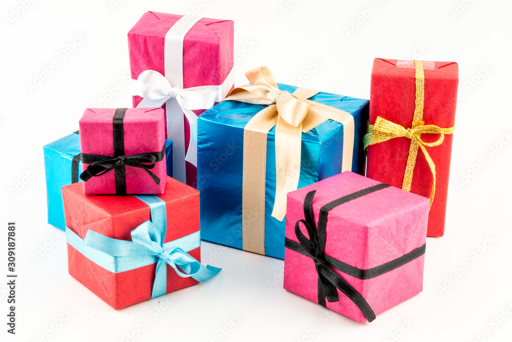 Obraz premium Big pile of colorful wrapped gift boxes isolated on white background. Mountain gifts. Beautiful present box with overwhelming bow. Christmas surprise icon. Happy new year decor, discounts, promotions.