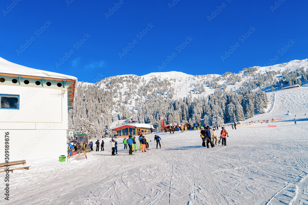 Zillertal Arena ski resort and people skiing Mayrhofen at Austria