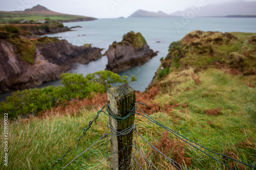 A misty day in Smerwick harbour on the Dingle peninsula  photo