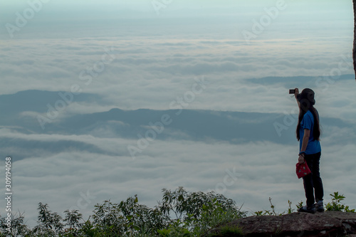 woman on top of mountain