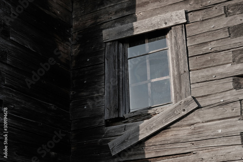 Architecture, window in a country house, view of an old wooden house, cinematic. 